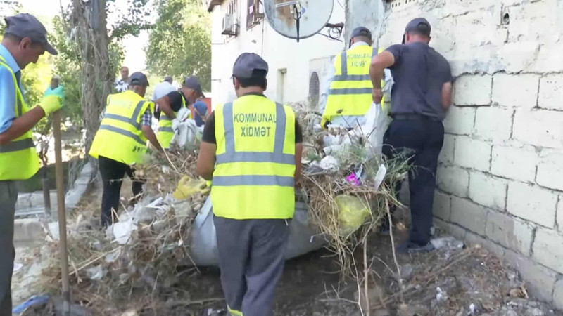 Yeni Günəşlidəki binanın paradoksu: ərazini öz əlləri ilə zibilləyən sakinlər hökumətdən abad həyət istəyirlər - VİDEO