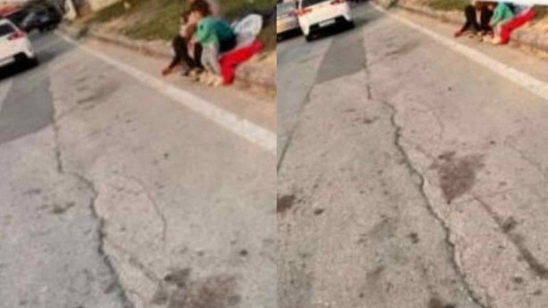 Gəncə prospektində qadın uşaqları ilə dilənir