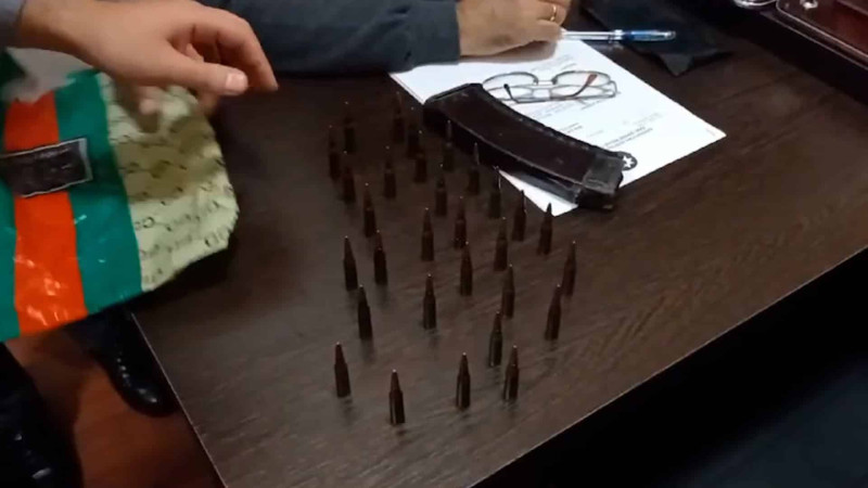 Bakıda  “Kalaşnikov” avtomatını gizlədən kişi tutulub - VİDEO