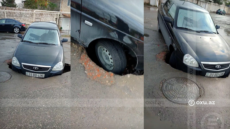 Bakıda maşın çuxura düşdü - VİDEO