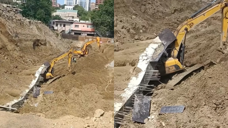 Bakıda bədbəxt hadisə: Beton divar ekskavatorun üzərinə aşdı - VİDEO