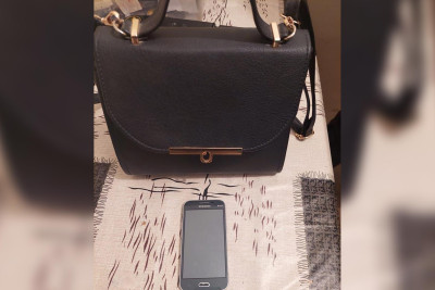 Qadın 14 il müddətinə azadlıqdan məhrum edilmiş ərinə mobil telefon ötürməyə çalışıb