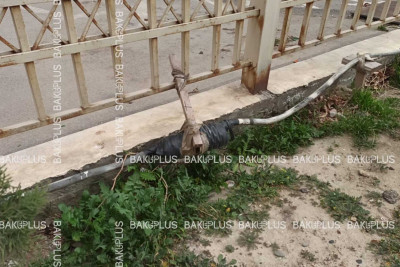 Nizami rayonunda düzgün çəkilməyən elektrik xətti sakinləri narahat edir