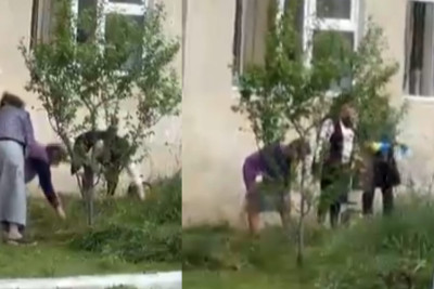 Bakıda məktəb direktoru xadimələrlə birgə məktəbin həyətini təmizləyib