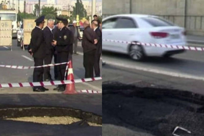 8 Noyabr prospektində yolun çökməsindən sonra təmir işləri aparılır