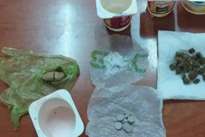 Bakıda kişi təcridxanada cəza çəkən tanışına yoqurt qutusunda narkotik keçirmək istəyib