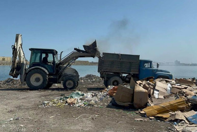 Lökbatan qəsəbəsində açıq ərazidə tullantılar təmizlənir