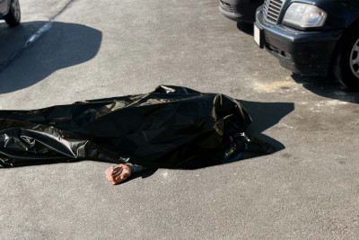 Bakıda kanalizasiya quyusundan meyit çıxarılıb