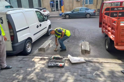 Nəsimi rayonunda divarlar və hasarlar boyanır