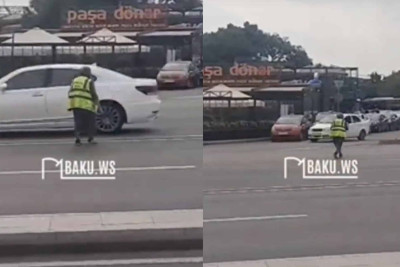 Bakıda təmizlik işçisi öz həyatını təhlükəyə atıb – VİDEO