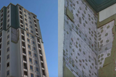 Yasamalda binanın fasadı qoparaq avtomobilləri əzib