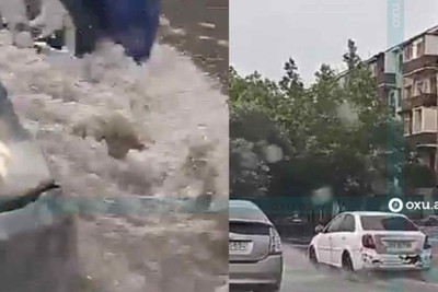 Yağışdan sonra Bakıda küçələri su basıb