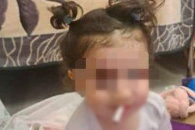 Körpəyə siqaret verib şəklini paylaşanlara - Rəsmi reaksiya