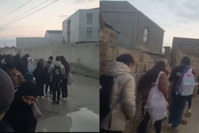 Xəzər rayonunda biabırçı mənzərə - Şagirdlər məktəbə girə bilmir + VİDEO