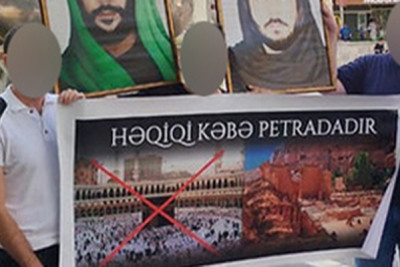 “28 Mall”un qarşısında plakat açan təriqət üzvləri həbs edildi